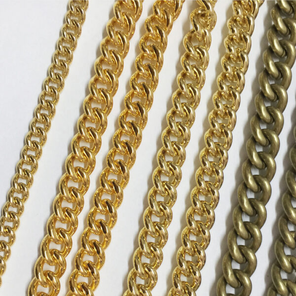 assorted gold metal chains in different link styles